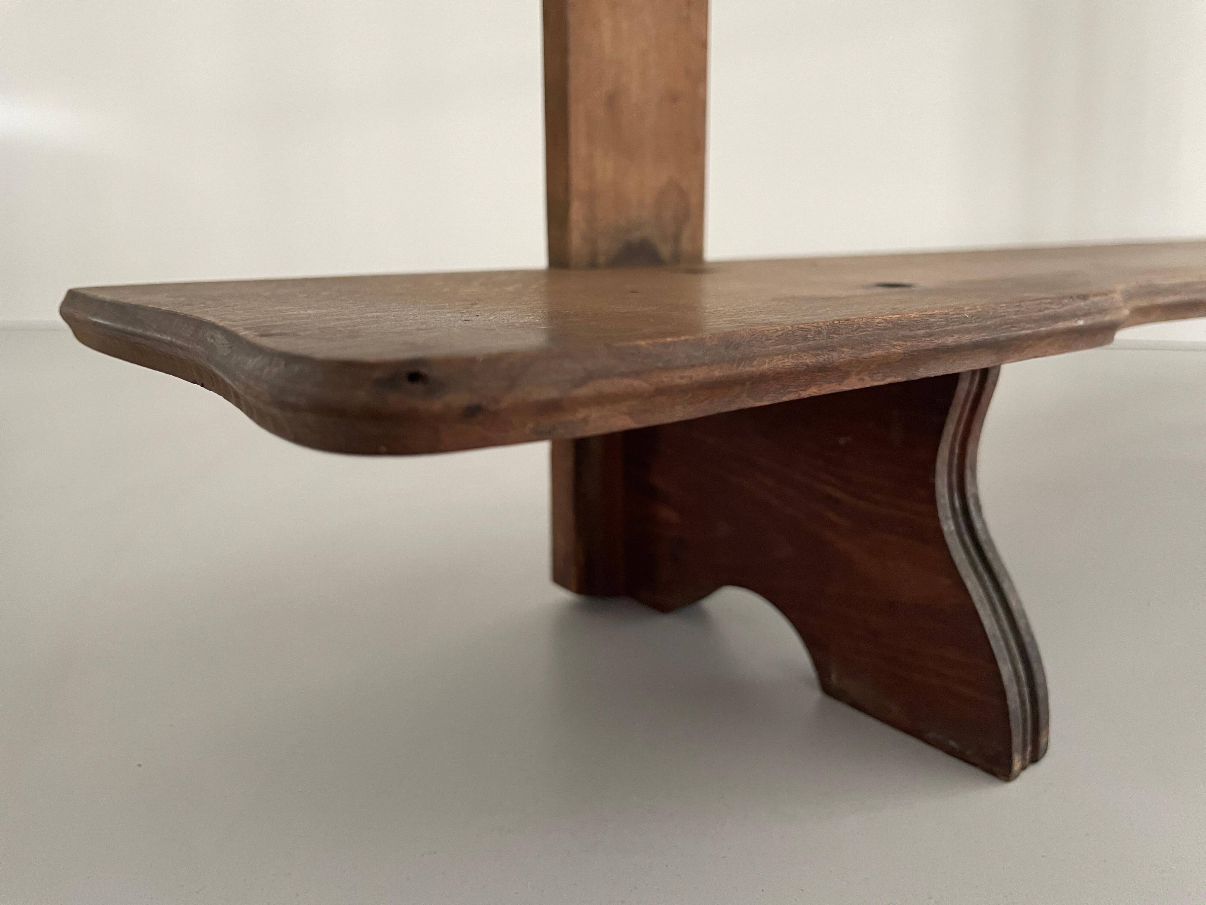 Art Deco wall shelf in wood with three levels, 1940s, Italy.
