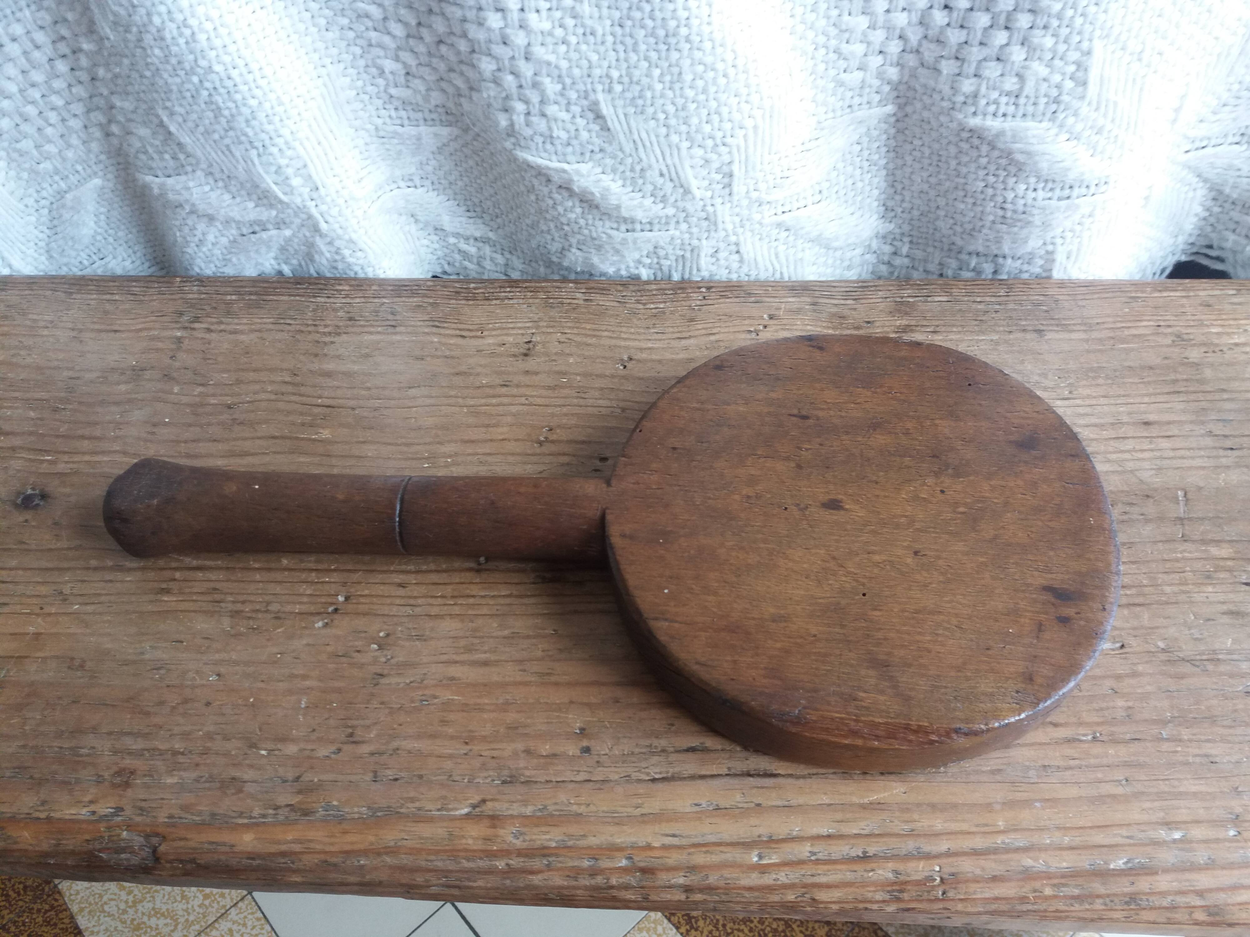 Washerwoman's laundry beater