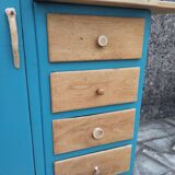 Asymmetrical changing table cabinet