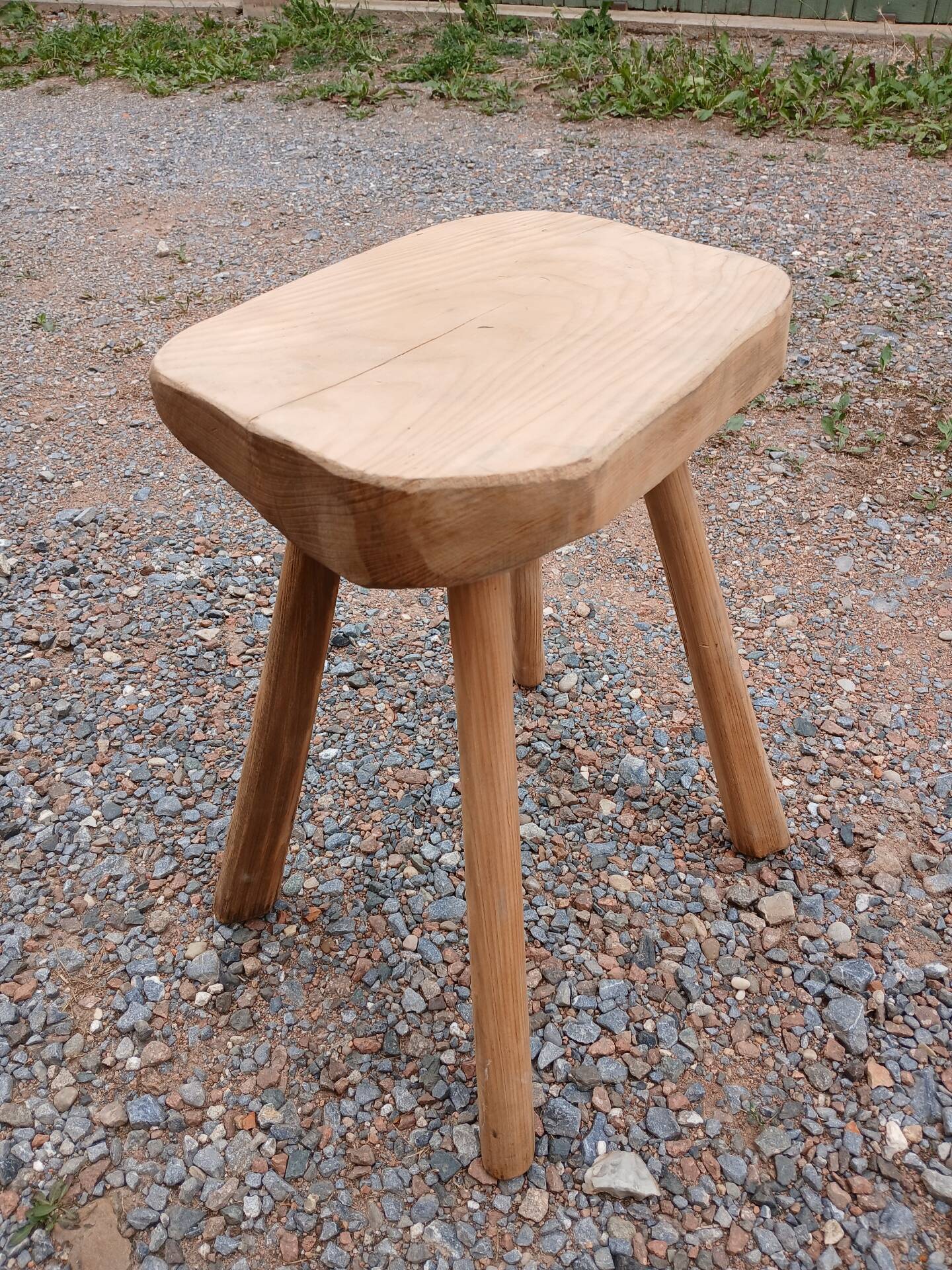 Antique stool in raw wood