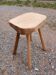 Antique stool in raw wood