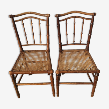 Pair of chairs canned in bamboo