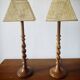 Pair of tall turned wooden lamps
