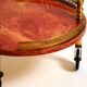 Round, small 1960s Aldo Tura serving or bar trolley in red goatskin leather