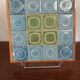 Vintage wooden and ceramic trivet