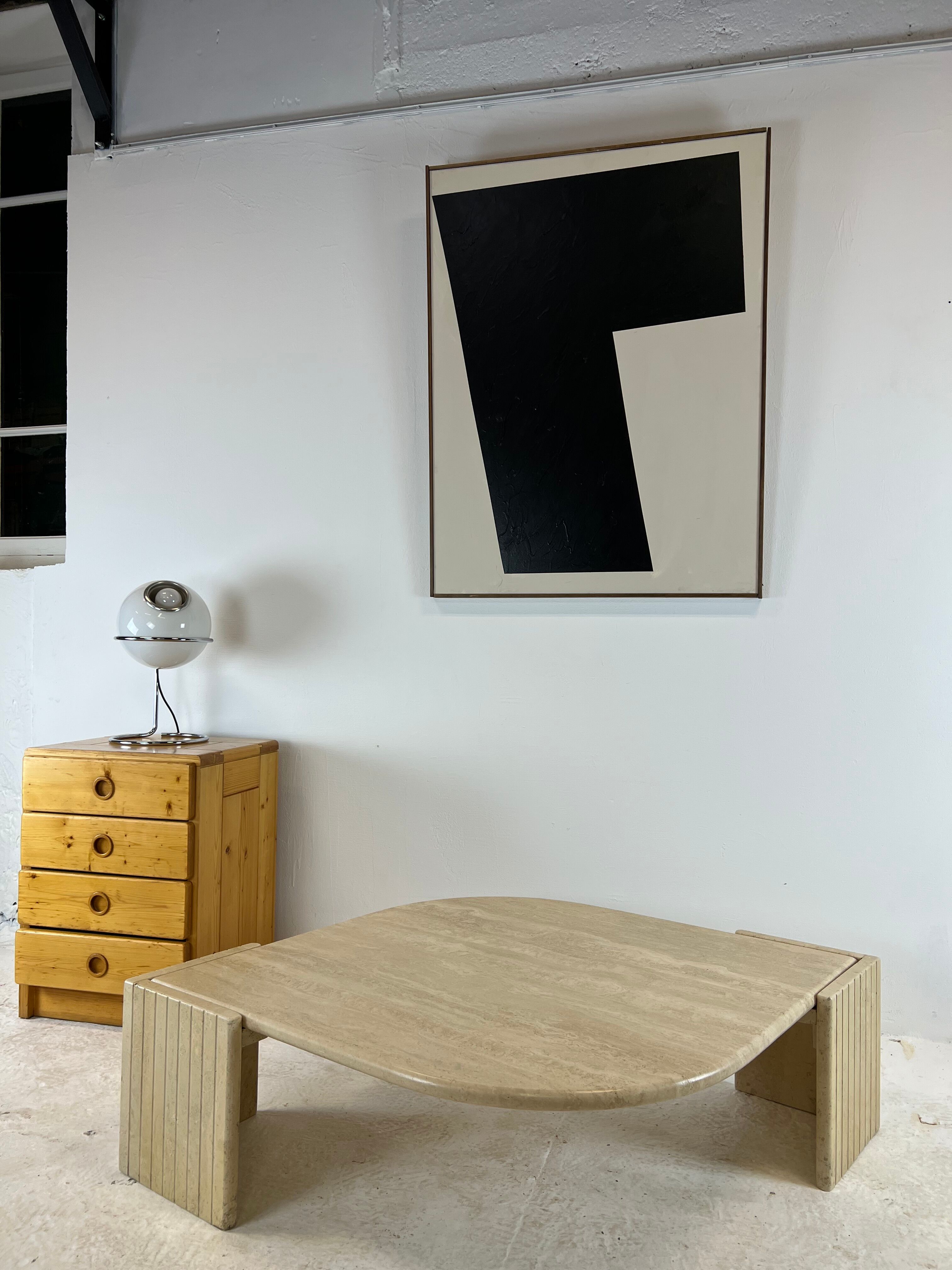 Coffee table Roche Bobois "eye" in travertine, 1970