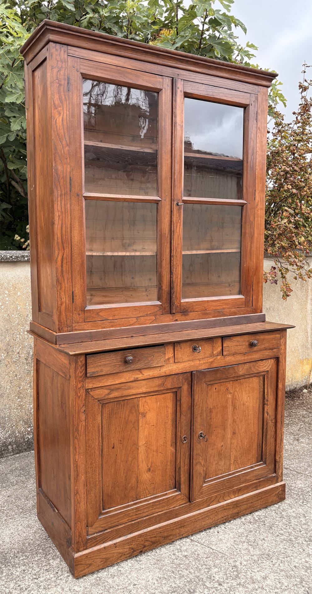 Two-body oak sideboard, circa 1890 — antique glasses and assembly