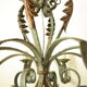 Lustre 8 branches en fer forgé patine gris de vert  et dorure ancien