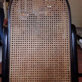 Vintage canneal rocking-chair