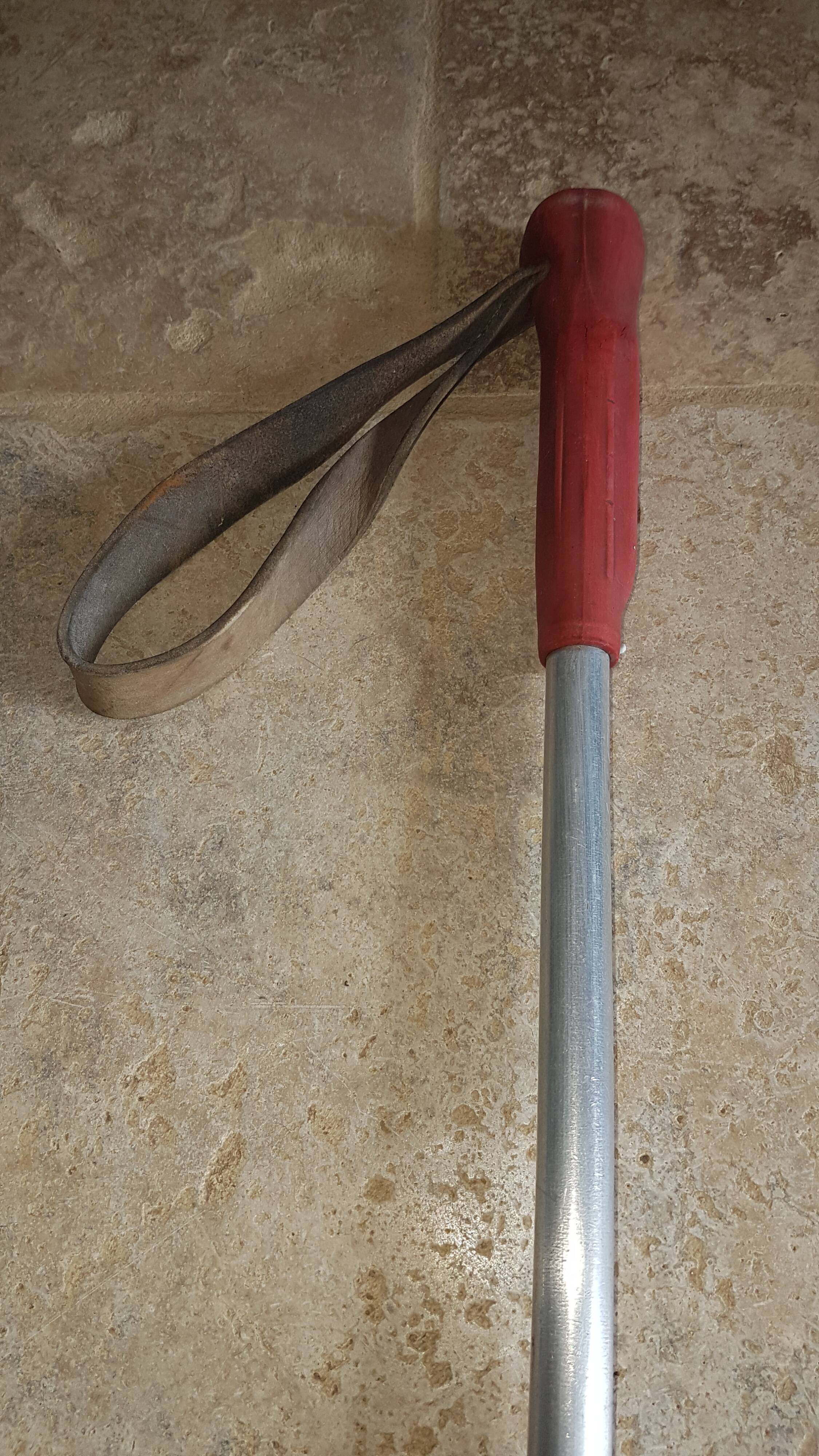 Old skis wooden and its pair of sticks