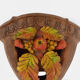 Corner wall lamp in terracotta with fruit decoration, signed D.Chadeau