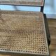 Vintage wooden and cane armchair