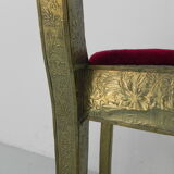 Dining chair upholstered with stamped tin
