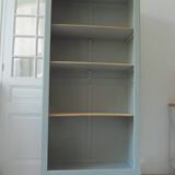 Vintage shallow bookcase re-enchanted in verdigris.