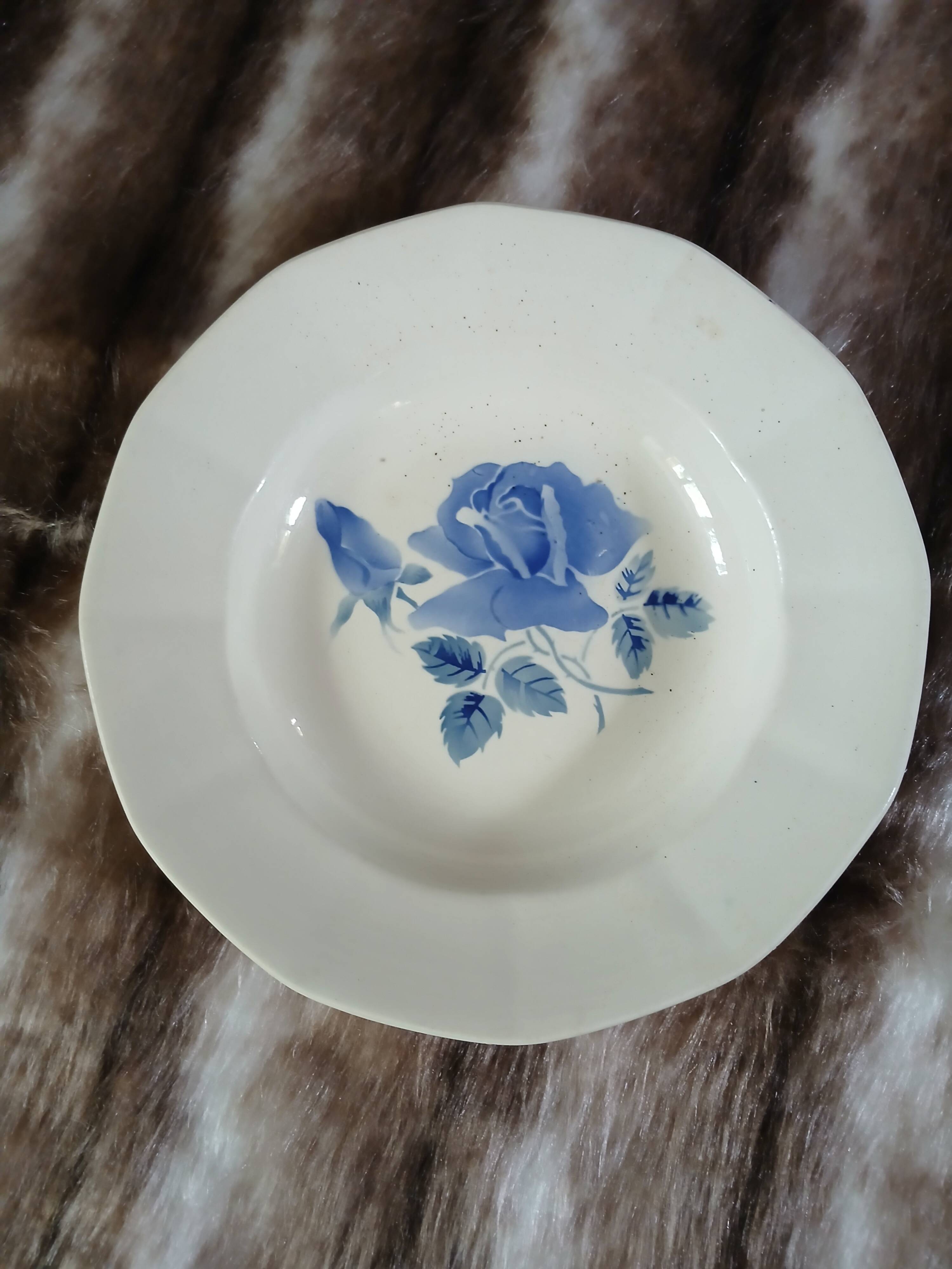 8 mismatched antique deep plates