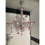 Chandelier in transparent and pink Murano-style glass with flower and leaf.