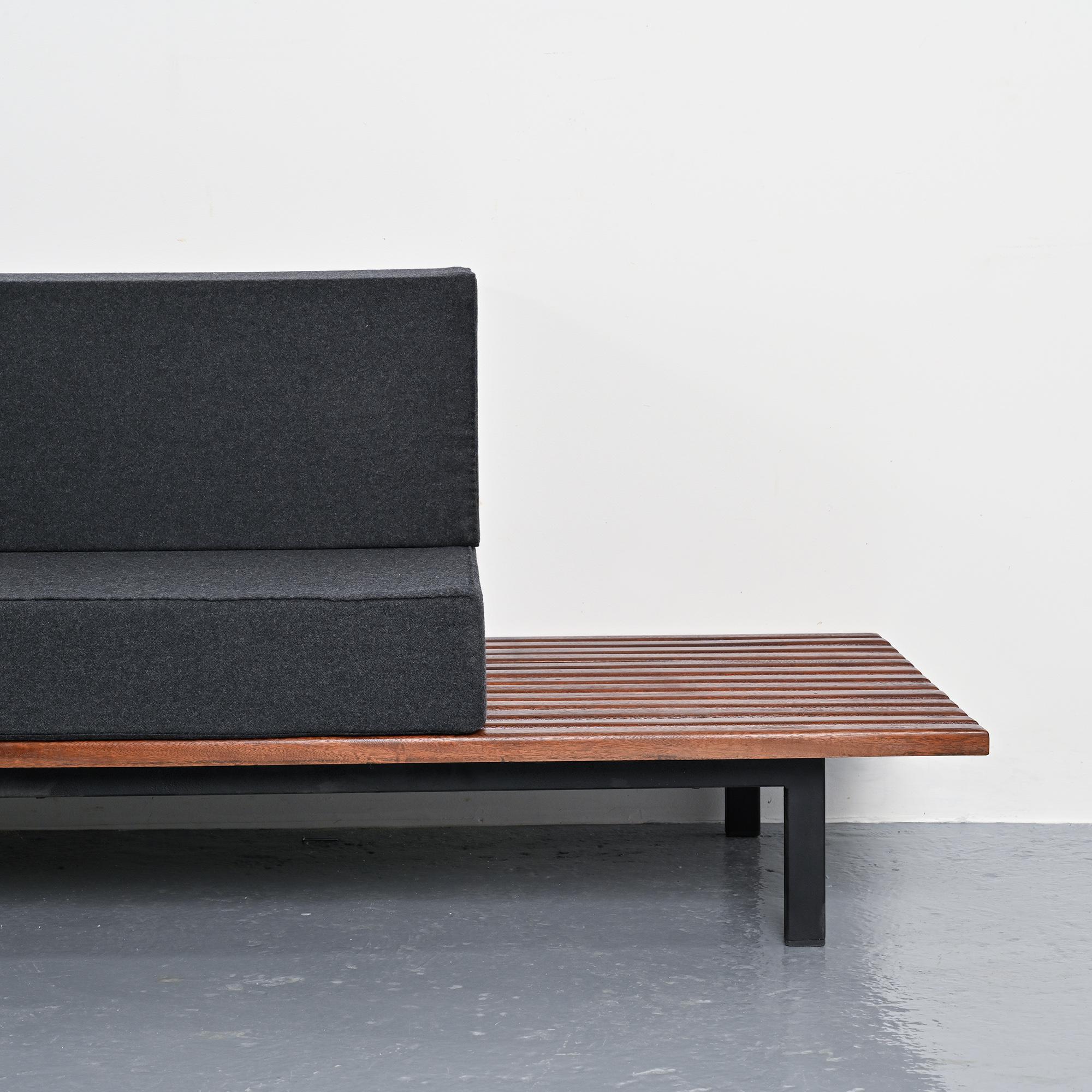 Cansado bench in mahogany by Charlotte Perriand, circa 1962.
