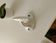 Antique Art Deco wall coat hook in enamelled cast iron.