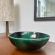 Green glazed ceramic bowl, signed Idlas.