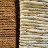 Straw and woven rope screen with metal structure