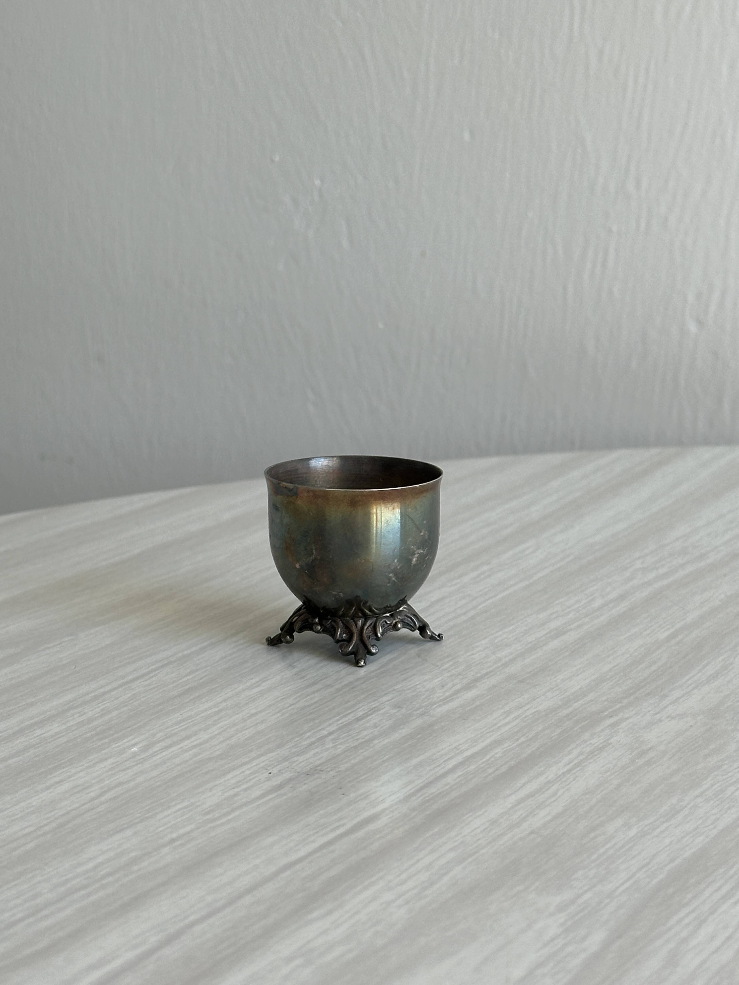 Small vintage metal egg cup
