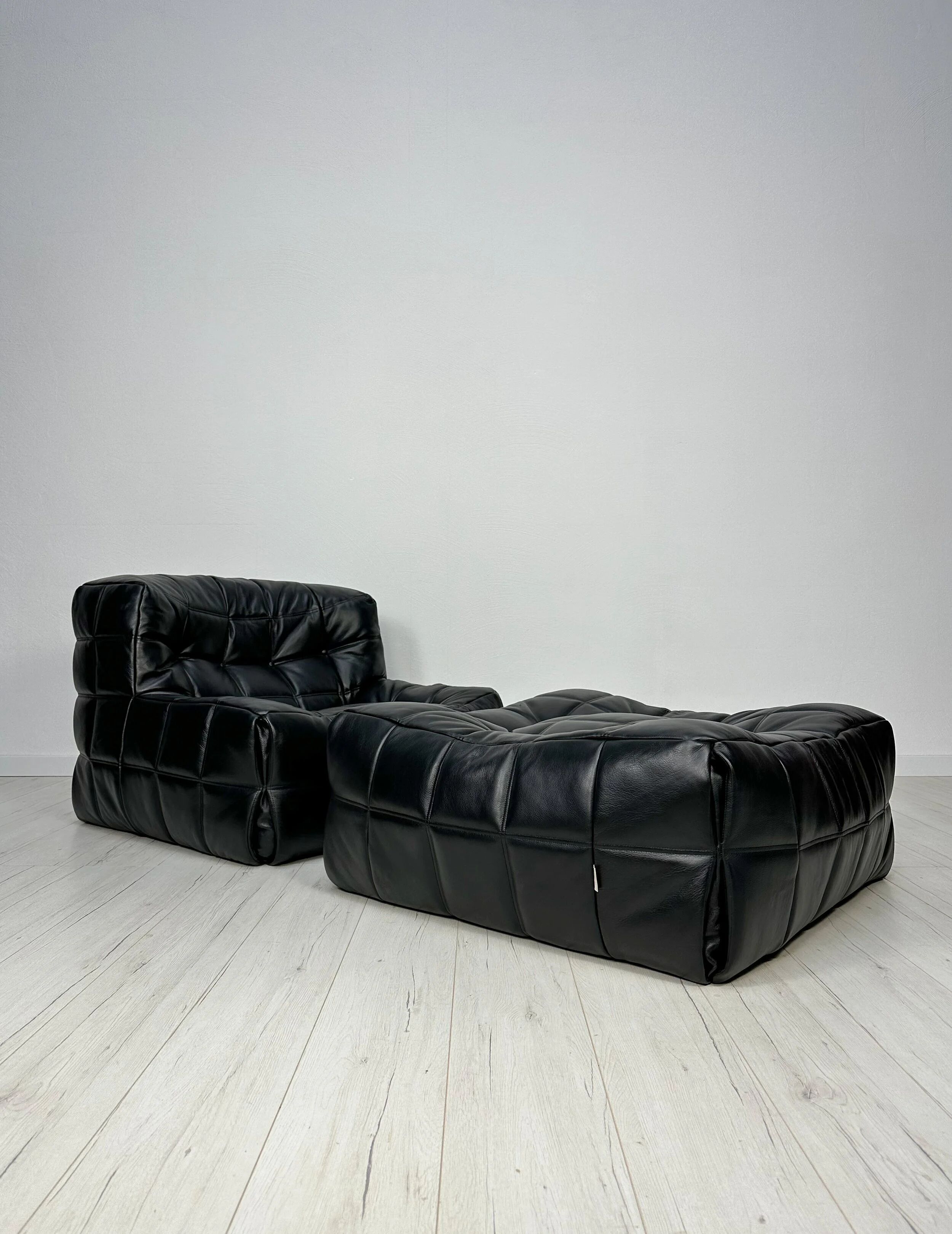 ‘80s vintage leather Kashima 1-seater + ottoman by Michel Ducaroy for Ligne Roset