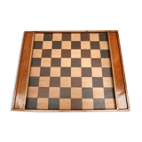 Old wooden checkers set and chessboard