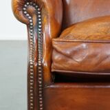 Sheepskin leather wingback chair with patina
