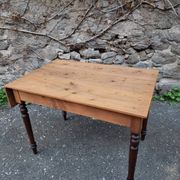 Vintage pine table with drop-leaf extension and turned beech legs, France, 1930s.