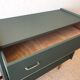 Dark green vintage dresser.