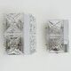 Pair of modernist 1970s glass and chrome metal wall sconces