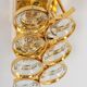 Golden brass and crystal wall light by Palwa, Germany, 1960s.
