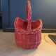 Red painted rattan basket