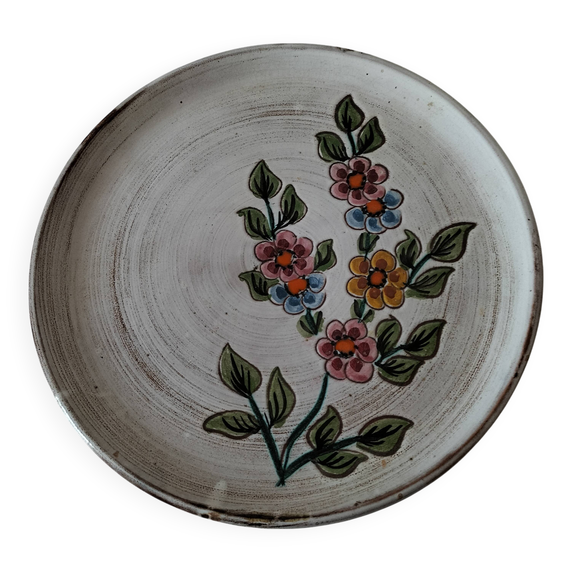 Glazed stoneware plate with floral motif
