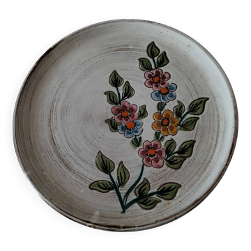 Glazed stoneware plate with floral motif