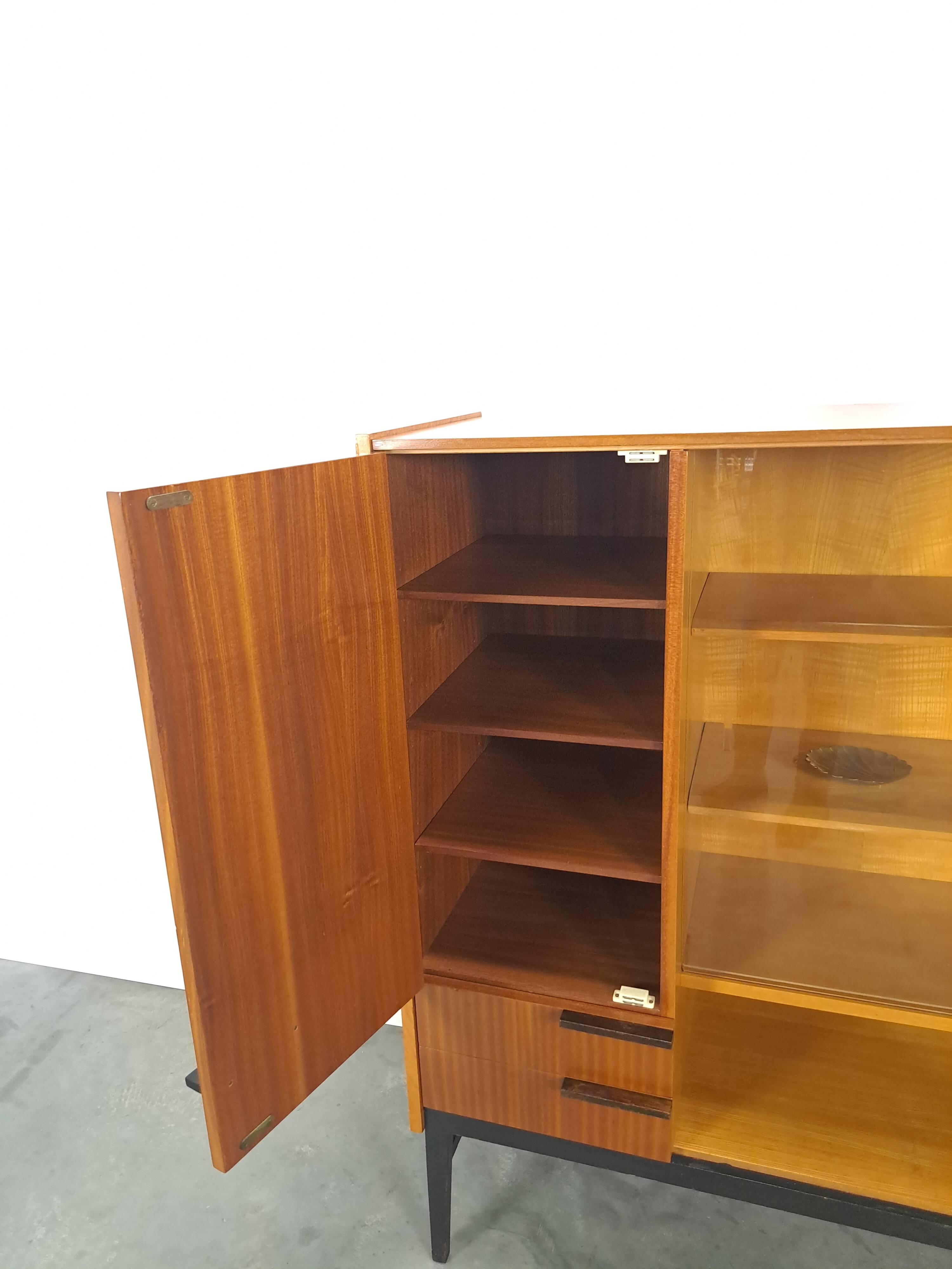 Design Mezulanik showcase with shelves