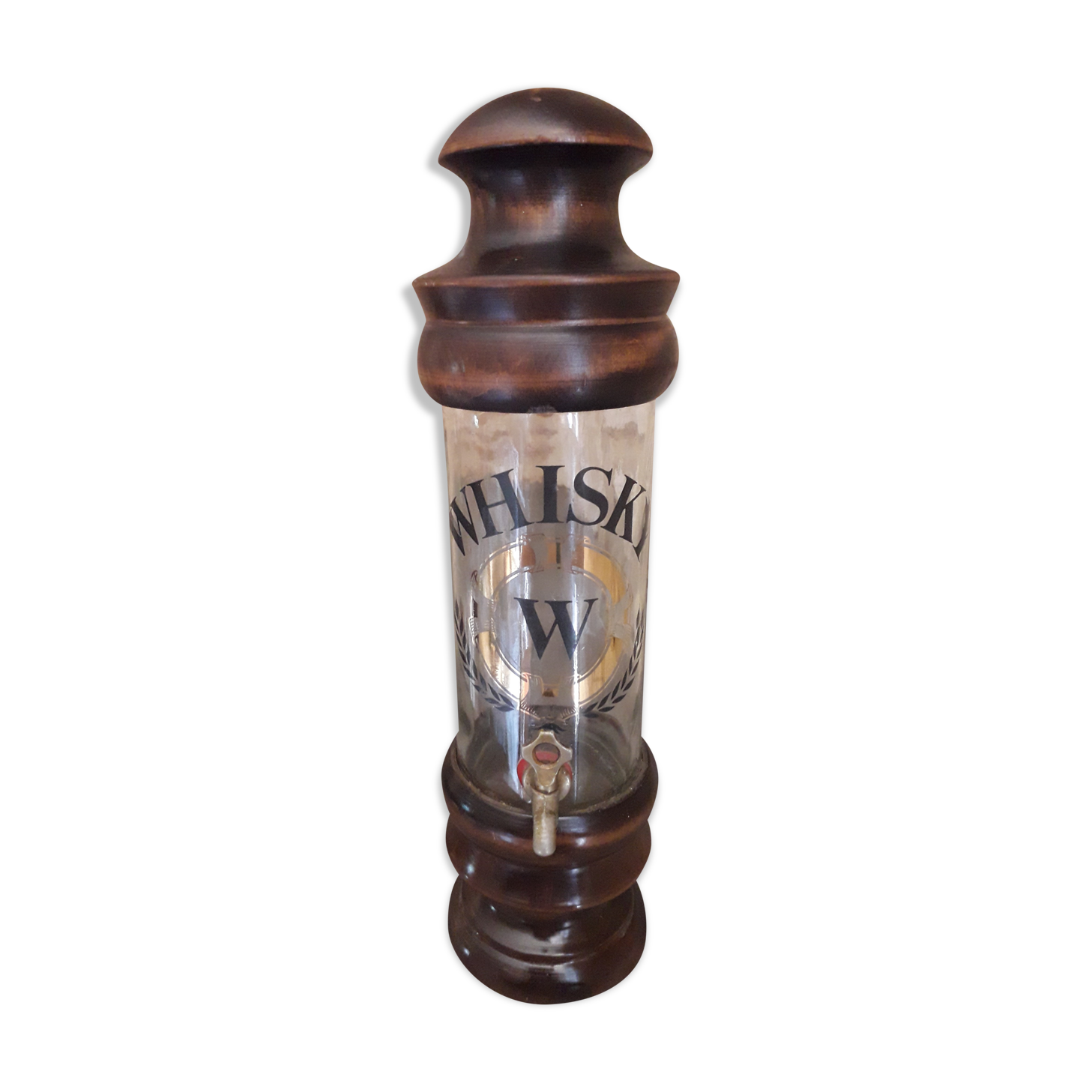 Vintage glass and wood whiskey bottle with pouring tap