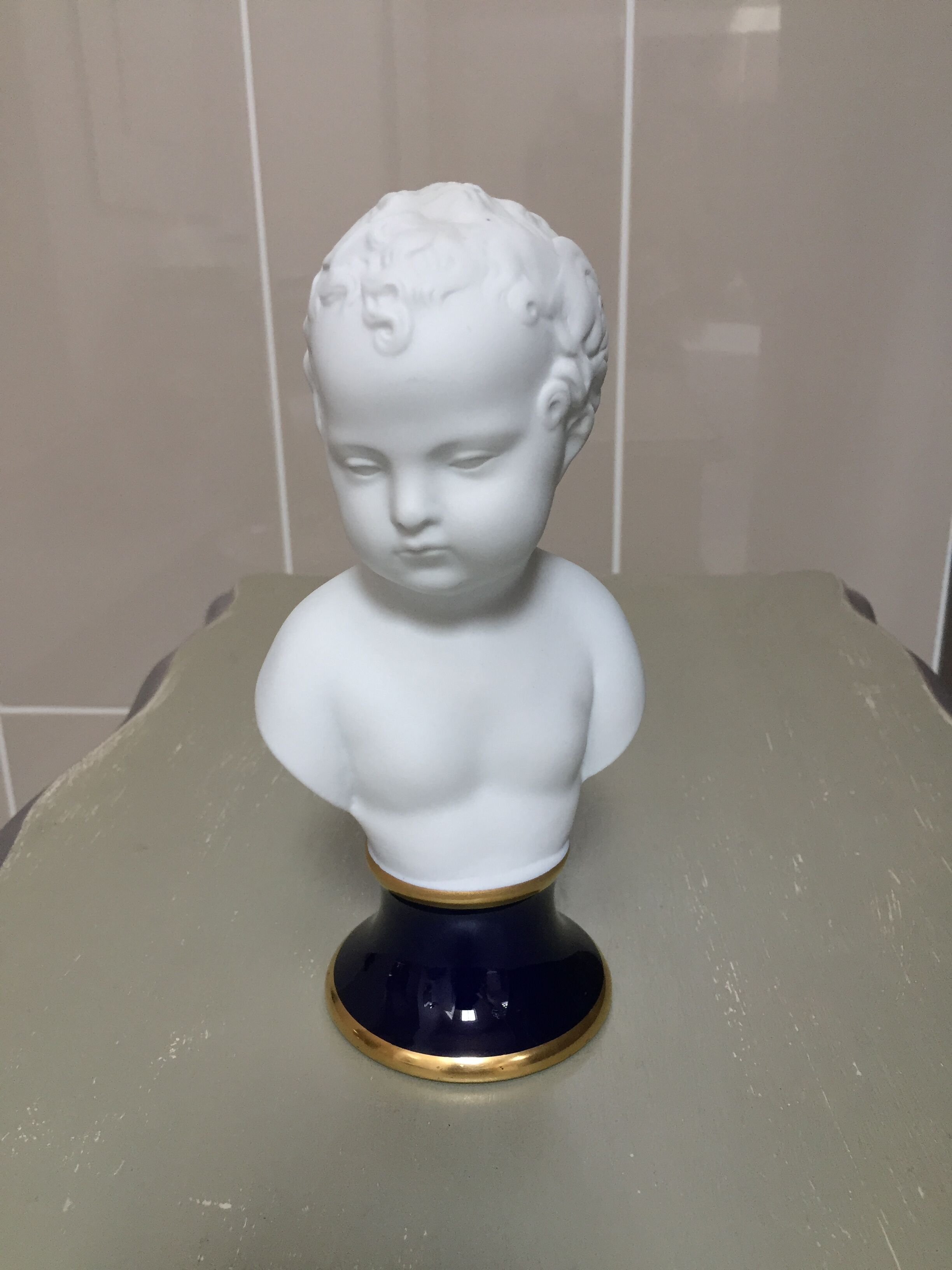 Child bust in limoges porcelain