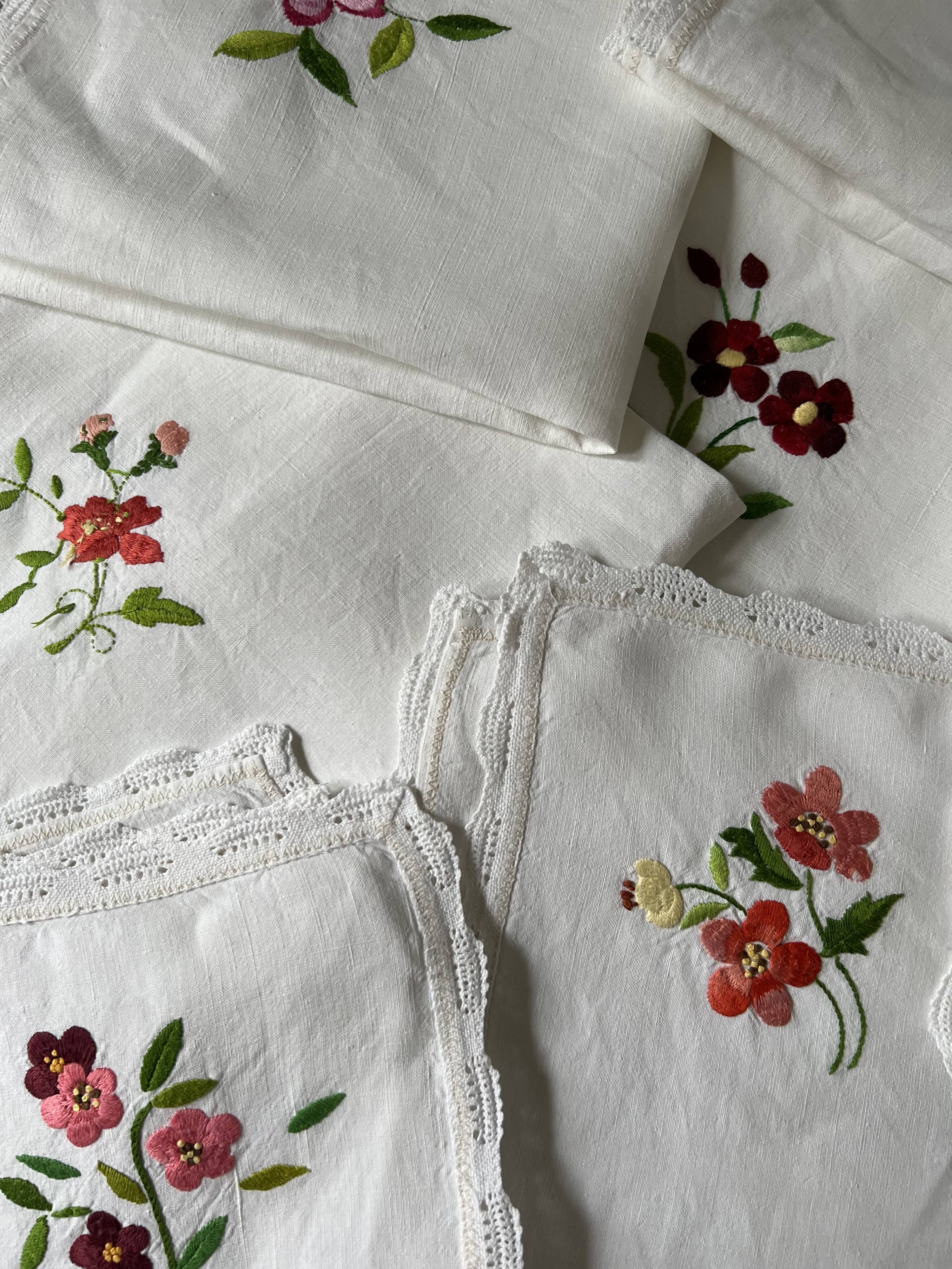 7 antique and embroidered napkins