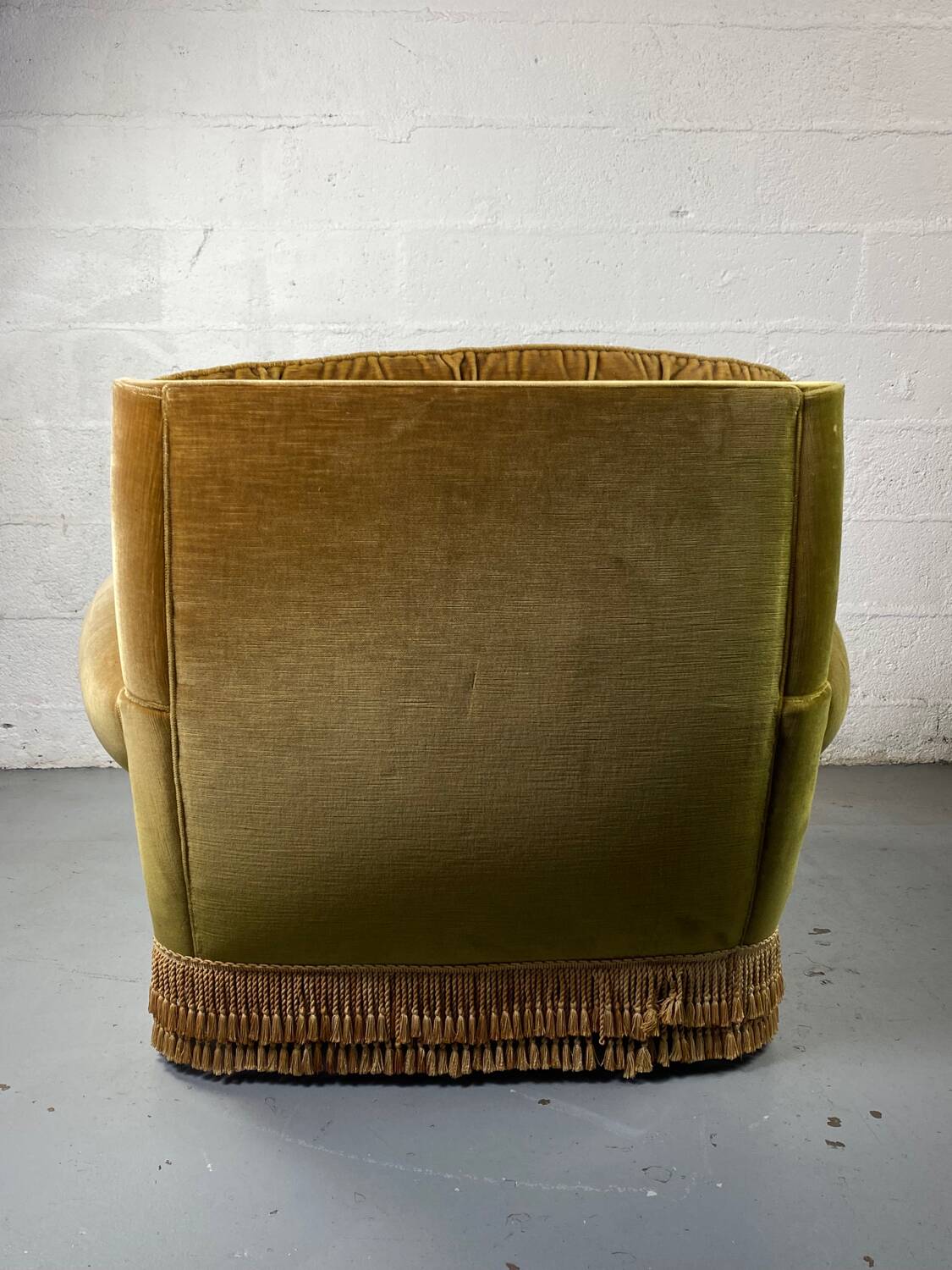 Fauteuil club vintage en tissu vert