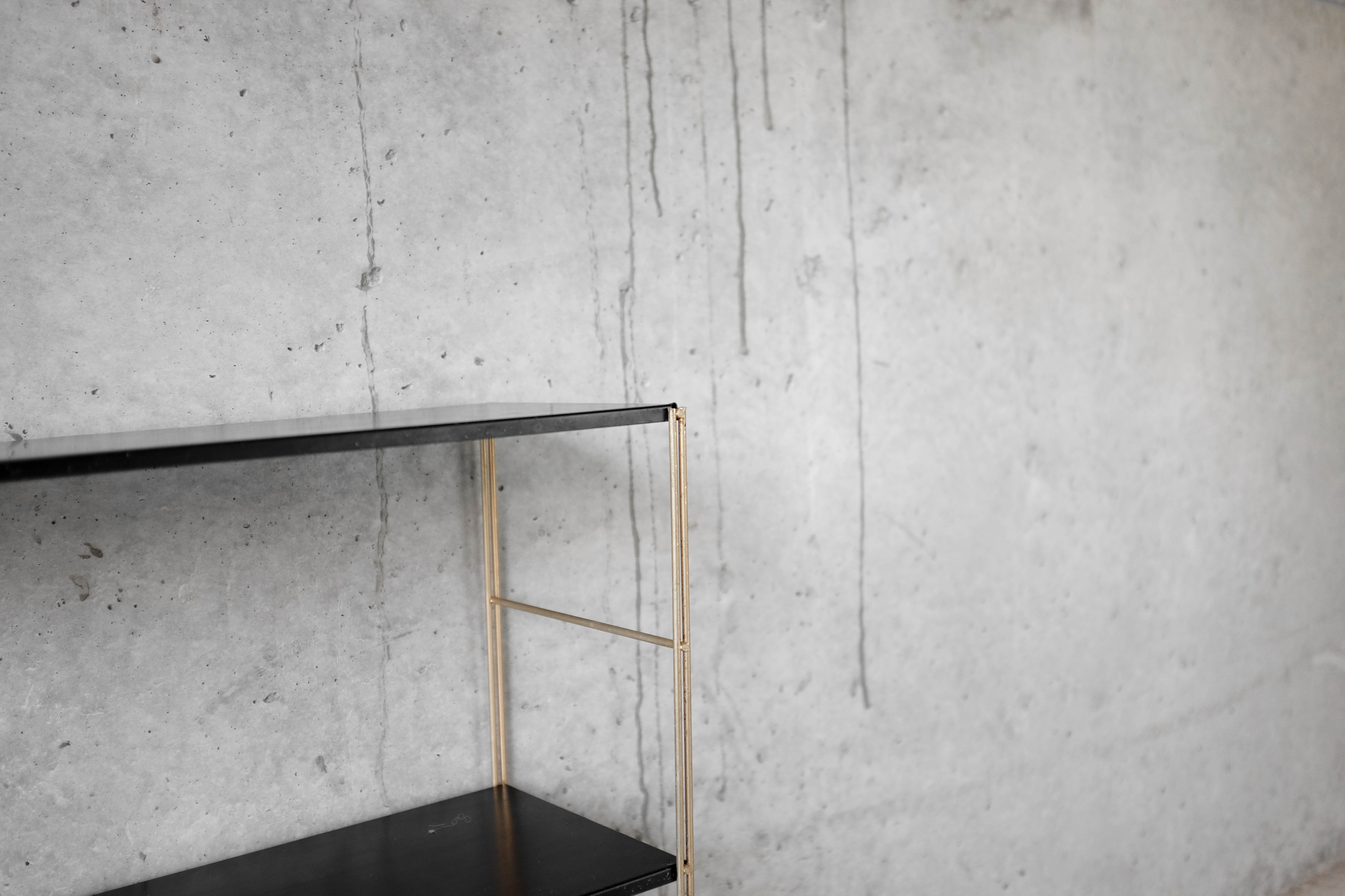 Brass string shelf
