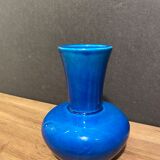 Signed vase in turquoise blue earthenware
