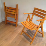 Pair of folding armchairs in varnished wood signed Clairitex