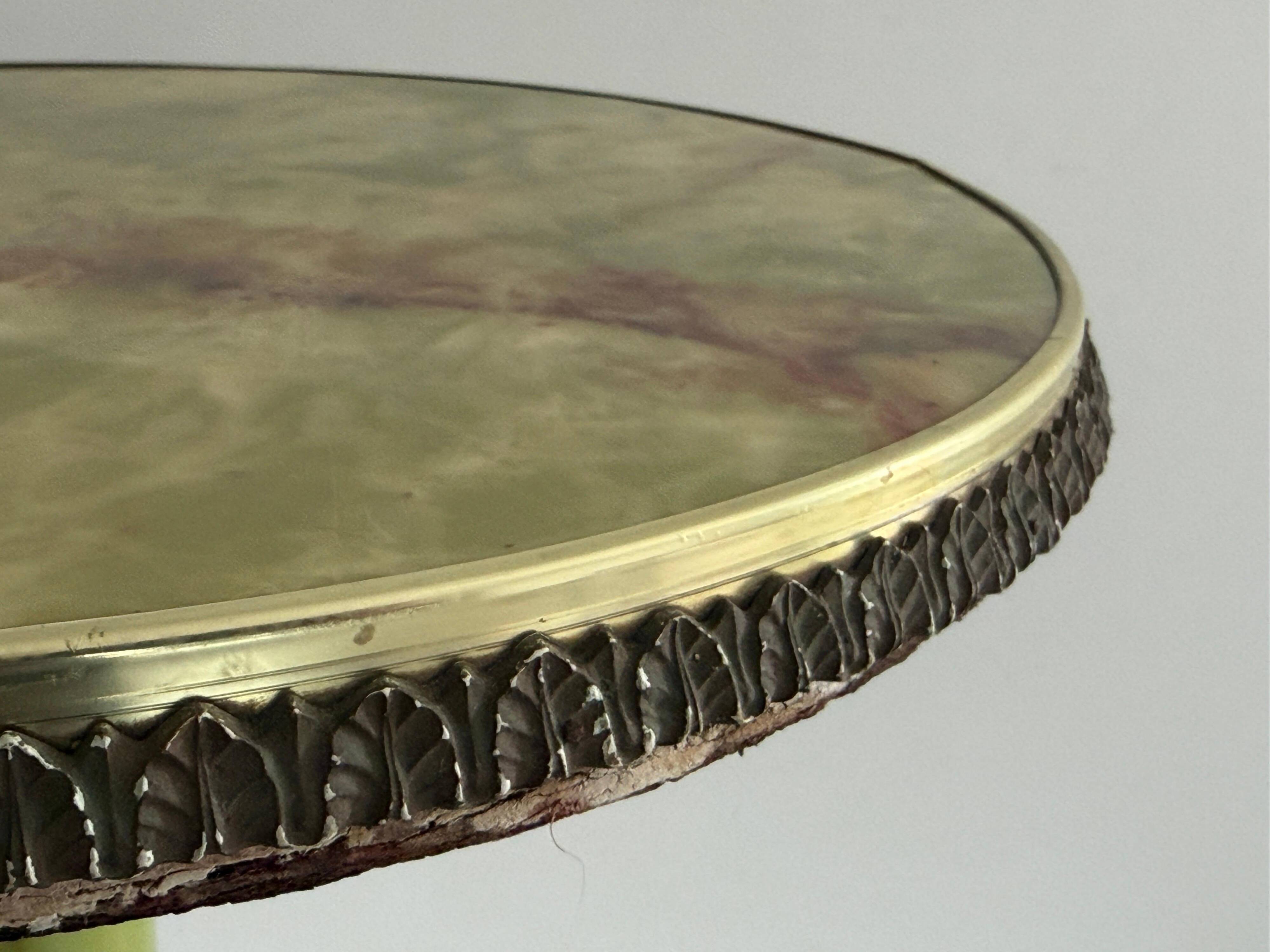 Mid-century side table in green marble with a brass base, 1960s, Italy.