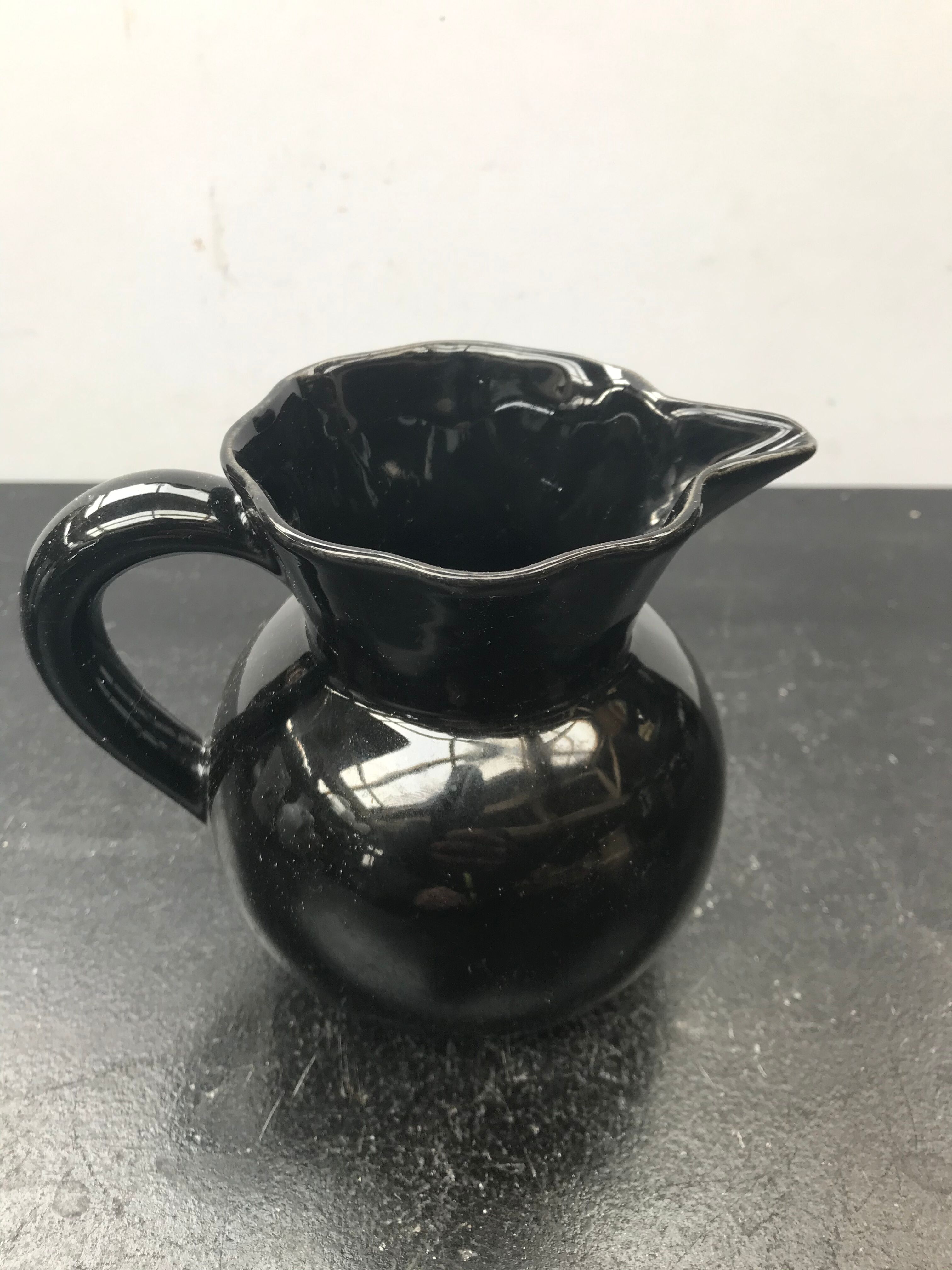 Former black ceramics pitcher vintage 70s