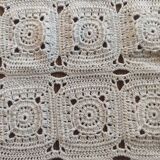 Embroidered crochet tablecloth