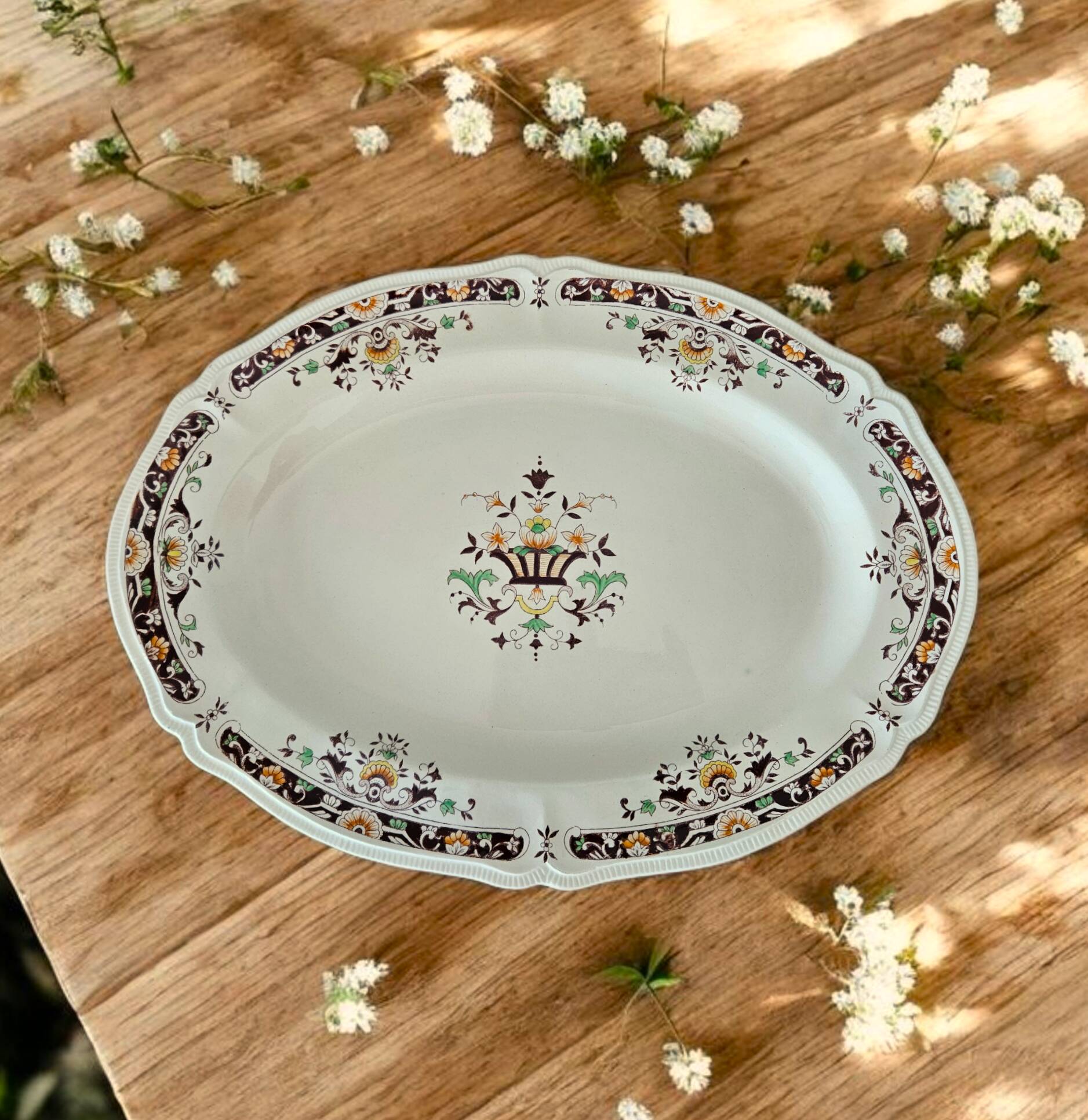 Antique serving dish in Longchamp earthenware.