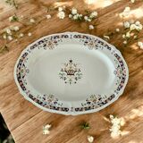 Antique serving dish in Longchamp earthenware.