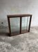 Dark-stained wood and glass vintage display cabinet — early 20th-century wall-mounted showcase
