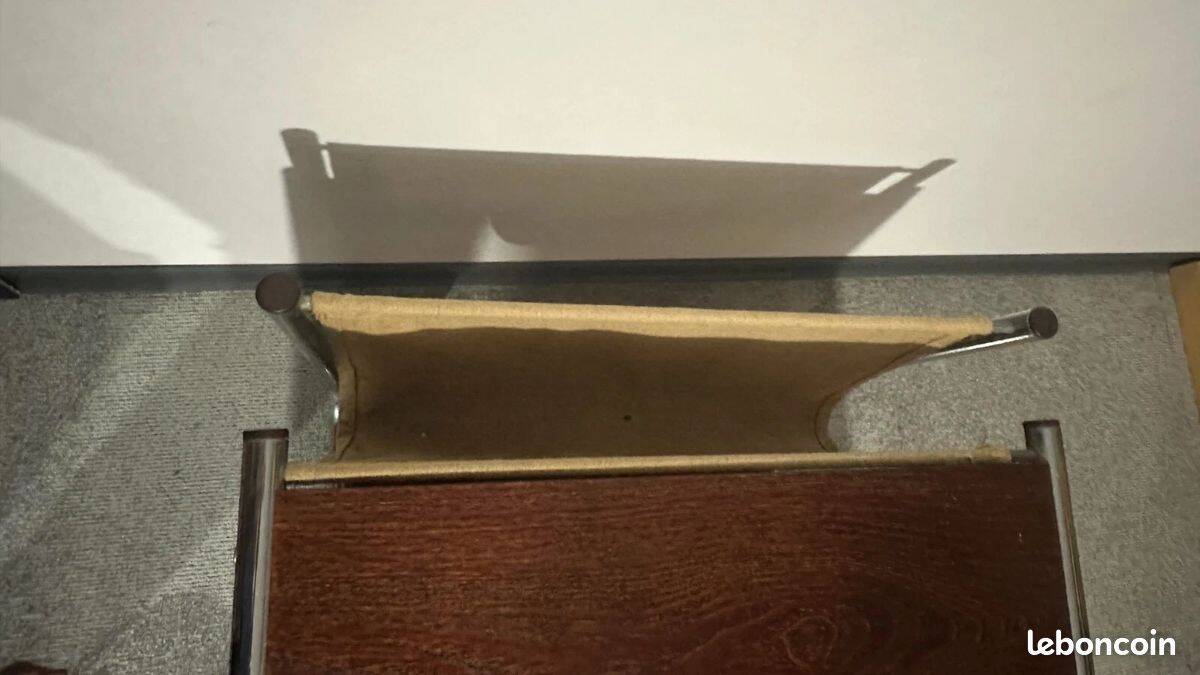 1970s/80s coffee table on casters with metal tubing, light-colored door